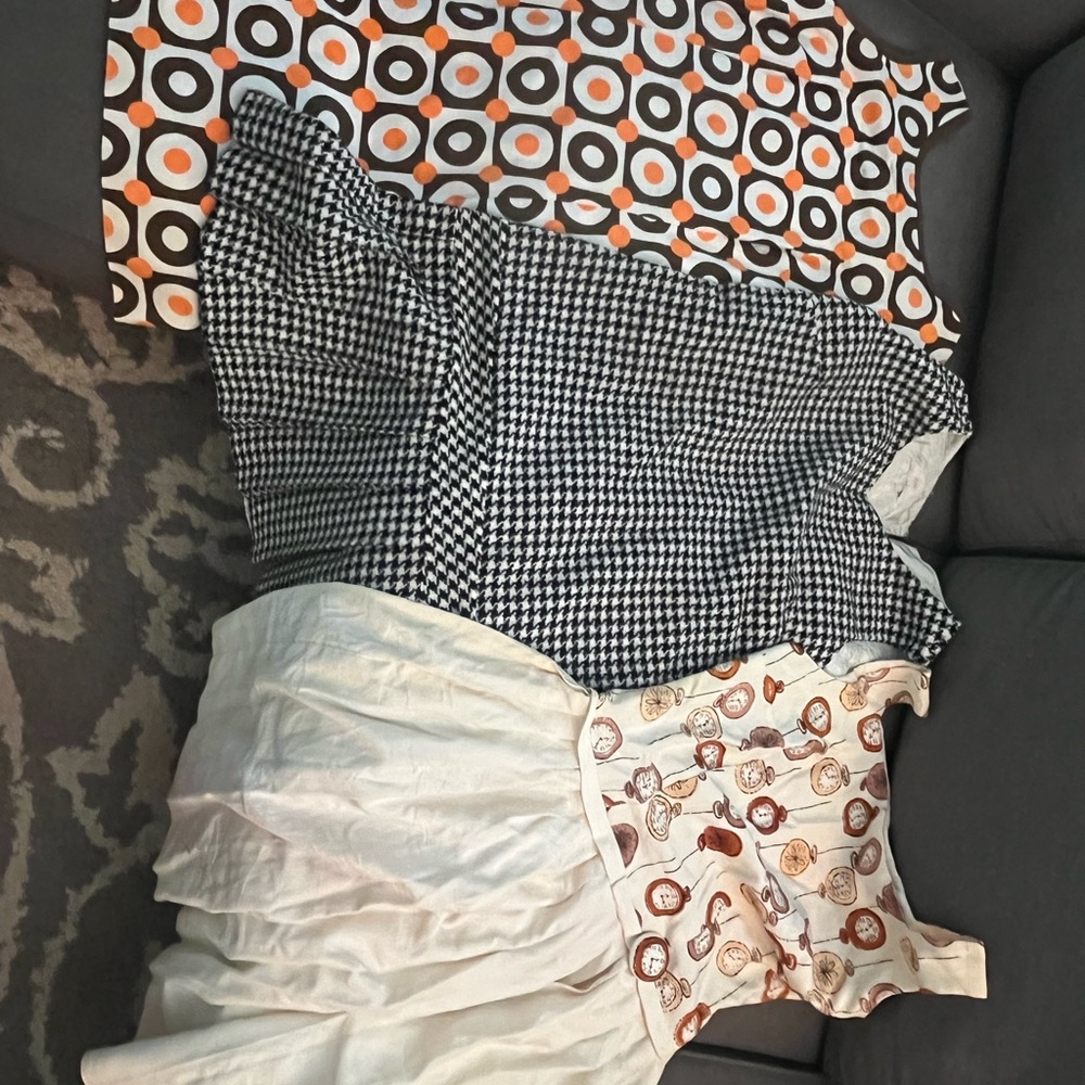 Stylish Vintage Dress Trio in Black, White, and Orange